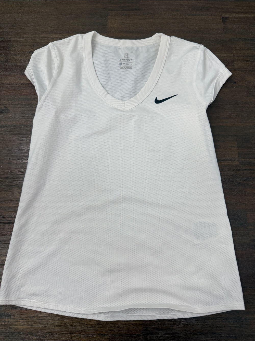 Nike White Short-Sleeve V-Neck Dri-FIT Top with Black Swoosh